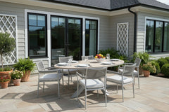 Edison Natural - Six Seater Oval Dining Suite with Barcelona Chairs