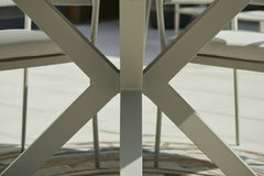 Edison Natural - Four Seater Round Dining Suite with Barcelona Chairs